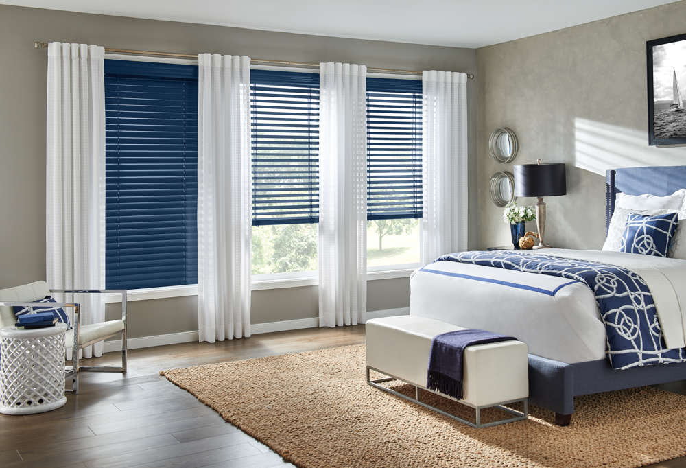 blue wood blinds in bedroom
