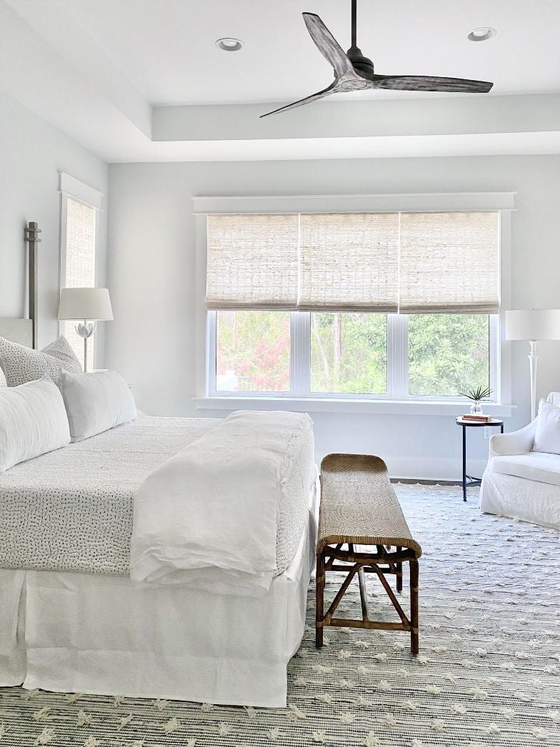 BB of Destin IS Natural Woven Shades White Bedroom.jpg
